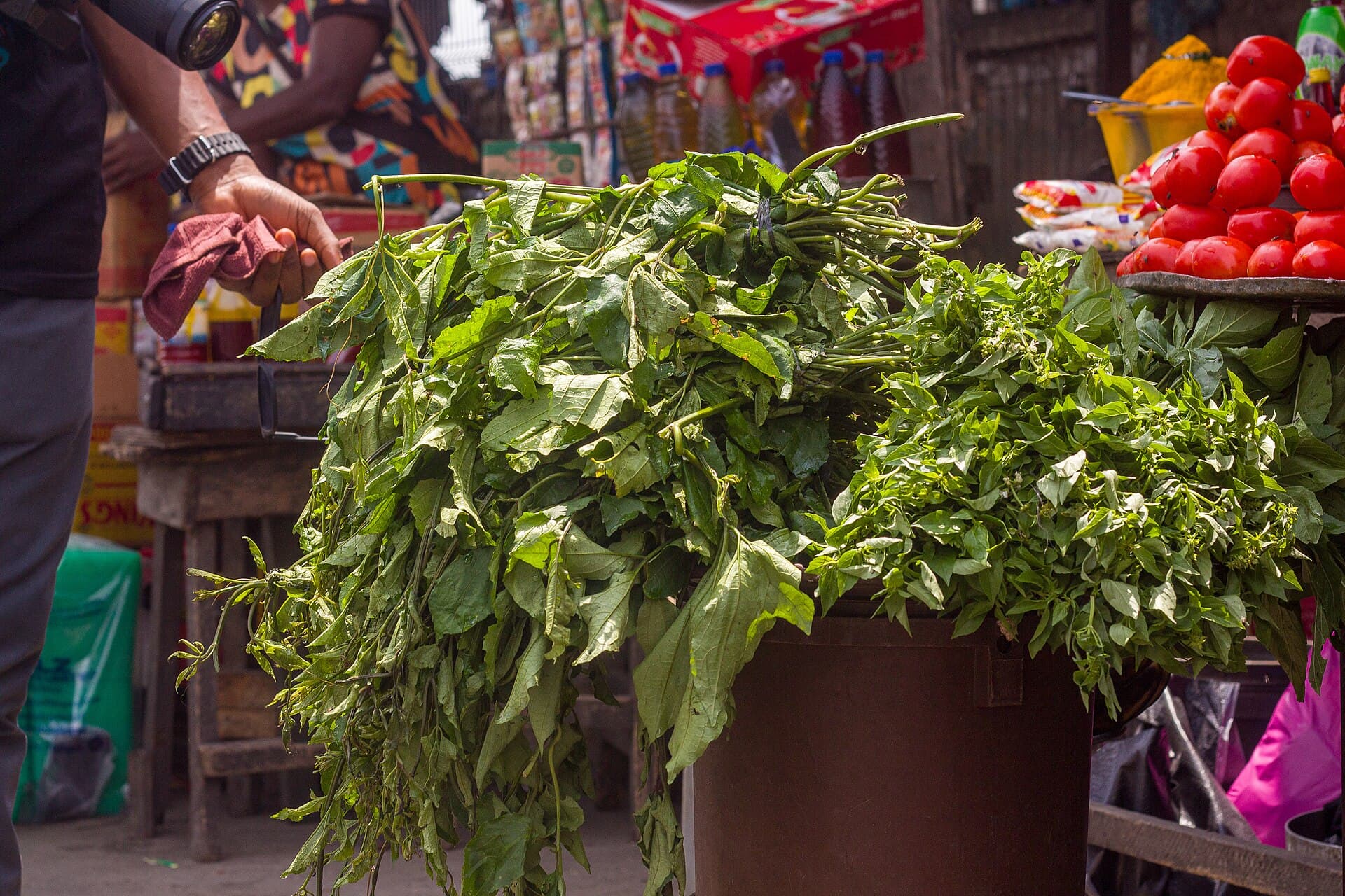 Ugu and tomatoes at the stall